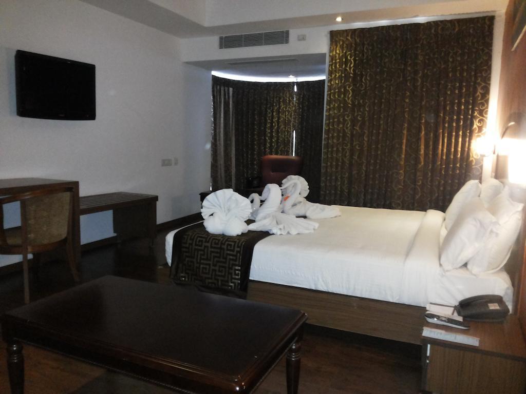 Hotel Milestonnez Sriperumbudur Ruang foto