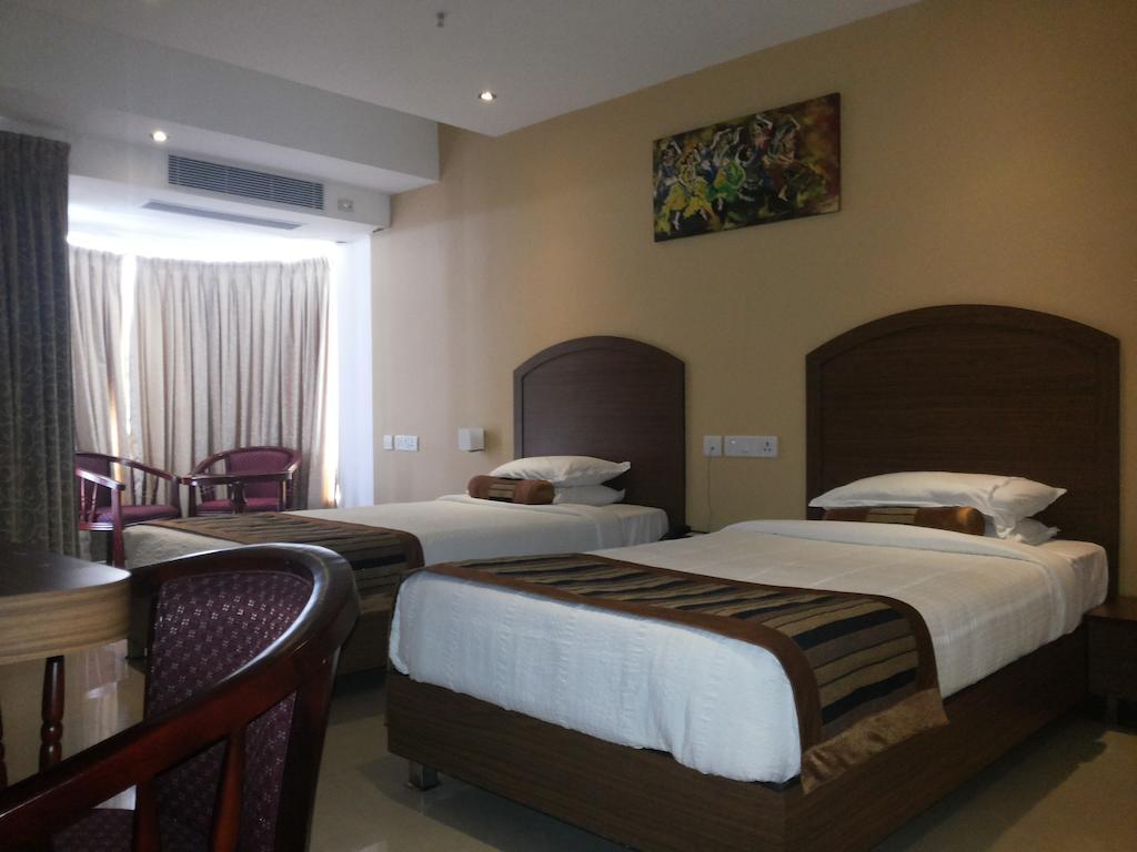 Hotel Milestonnez Sriperumbudur Ruang foto
