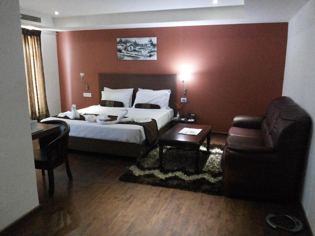 Hotel Milestonnez Sriperumbudur Ruang foto