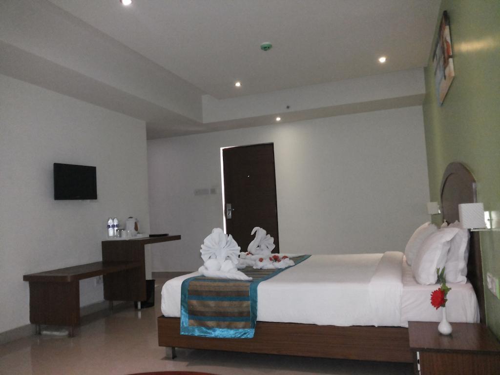 Hotel Milestonnez Sriperumbudur Bagian luar foto